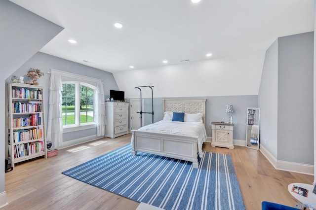13559 Monte Vedra Rd SE, Huntsville, AL 35803 - bedroom with lofted ceiling, light wood-style floors, and recessed lighting
