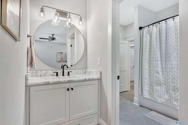 13559 Monte Vedra Rd SE, Huntsville, AL 35803 - bathroom with vanity, a ceiling fan, and tile patterned flooring
