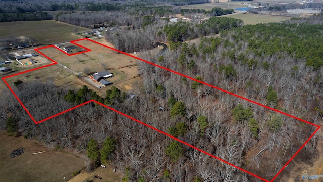 birds eye view of property with a rural view