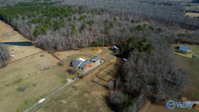 birds eye view of property with a rural view