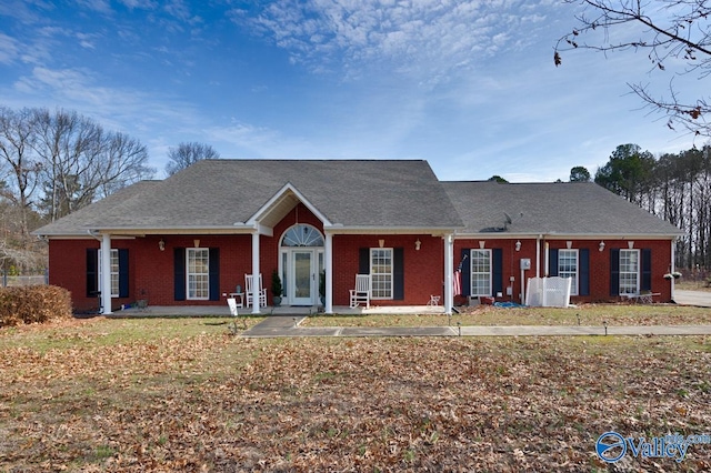 view of front facade featuring brick siding