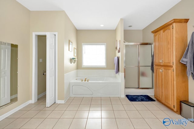 full bath with baseboards, a shower stall, a bath, and tile patterned floors