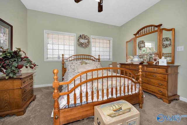 carpeted bedroom featuring baseboards