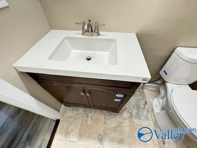 2950 Hood Rd SW Unit J, Huntsville, AL 35805 - bathroom with vanity and toilet