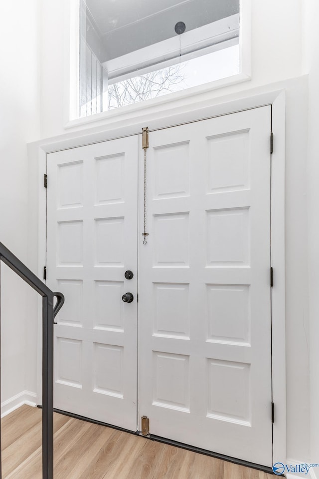 foyer featuring light wood-style flooring