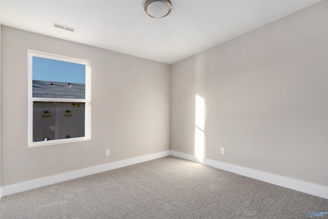 view of carpeted spare room