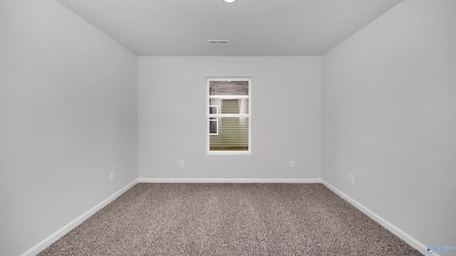 empty room with carpet flooring