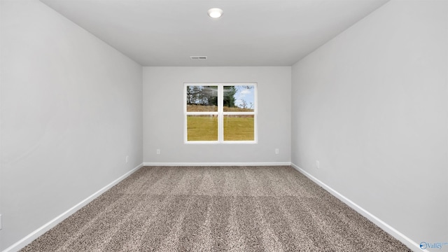 empty room featuring carpet floors