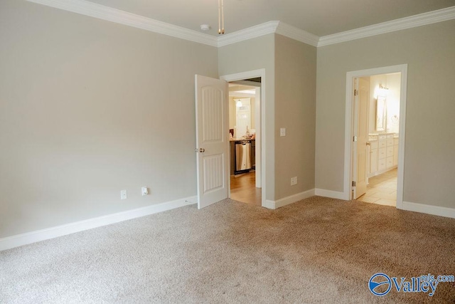 207 Somerton Dr, Huntsville, AL 35811 - unfurnished bedroom with carpet, ornamental molding, baseboards, and connected bathroom