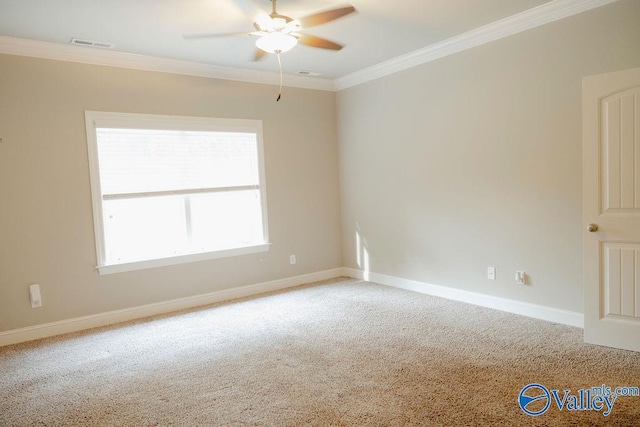 207 Somerton Dr, Huntsville, AL 35811 - empty room featuring ceiling fan, crown molding, carpet flooring, and baseboards