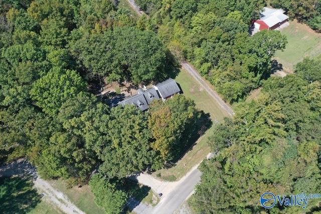 bird's eye view featuring a view of trees