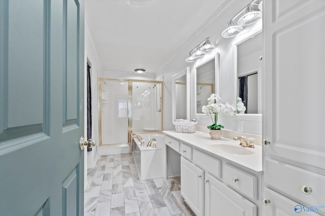 full bath with marble finish floor, a garden tub, a shower stall, and vanity