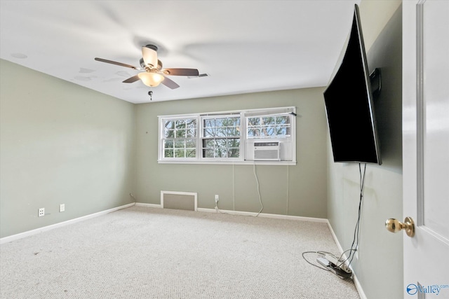 unfurnished room with carpet floors, visible vents, a ceiling fan, cooling unit, and baseboards