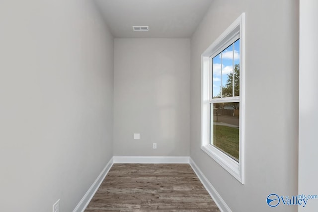 spare room featuring hardwood / wood-style floors