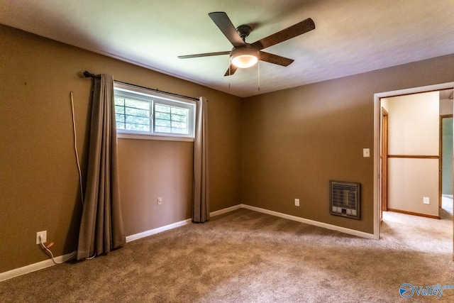 53 Price Mountain Dr, Decatur, AL 35603 - unfurnished room featuring a ceiling fan, heating unit, carpet, and baseboards