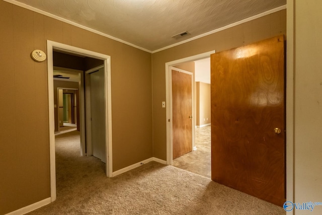 53 Price Mountain Dr, Decatur, AL 35603 - hallway featuring carpet floors, ornamental molding, and baseboards