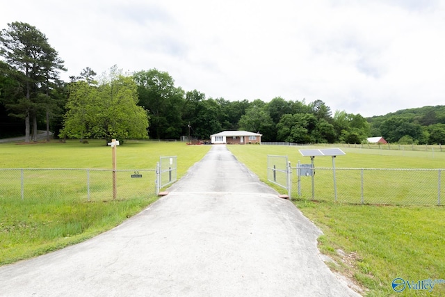 53 Price Mountain Dr, Decatur, AL 35603 - view of asphalt driveway featuring a gated entry and a gate