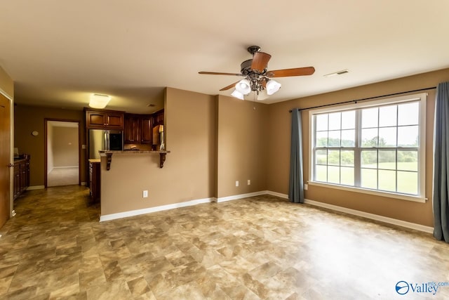 53 Price Mountain Dr, Decatur, AL 35603 - empty room with a ceiling fan and baseboards