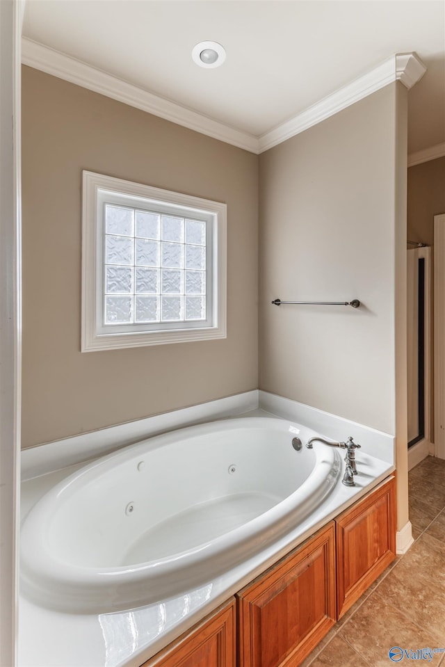 bathroom featuring a washtub, tile patterned flooring, and crown molding