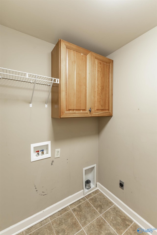 laundry room with cabinets, washer hookup, tile patterned flooring, and electric dryer hookup