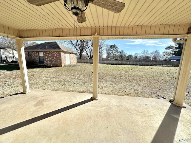 view of patio / terrace with an outdoor structure and ceiling fan