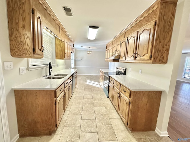 kitchen featuring sink, light tile patterned floors, and appliances with stainless steel finishes