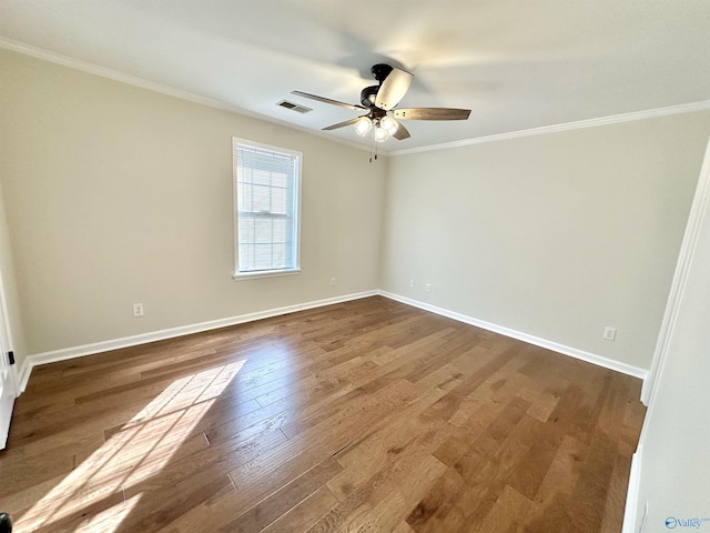 unfurnished room with wood-type flooring, ornamental molding, and ceiling fan