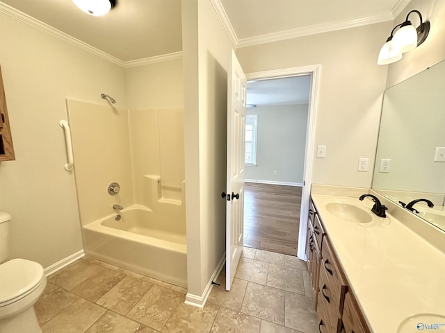 full bathroom with vanity, crown molding, shower / washtub combination, and toilet