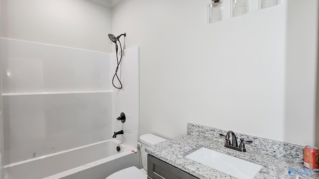 bathroom with bathing tub / shower combination, vanity, and toilet