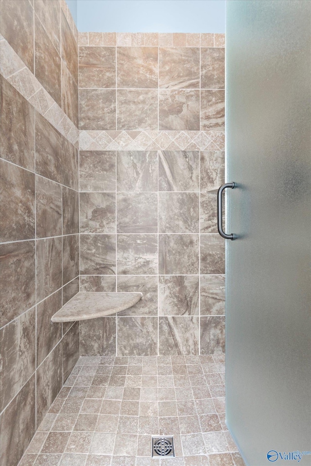 bathroom featuring an enclosed shower