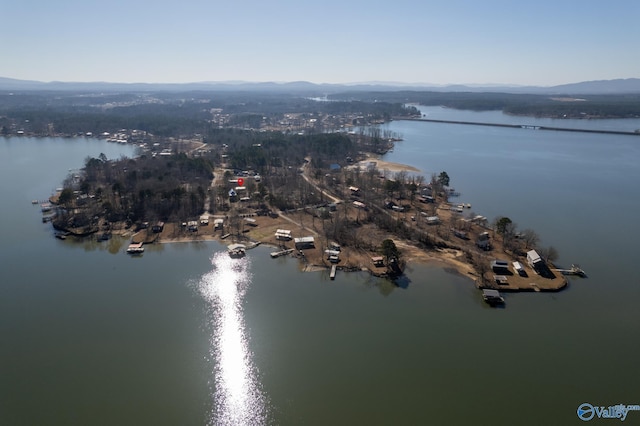 aerial view featuring a water and mountain view