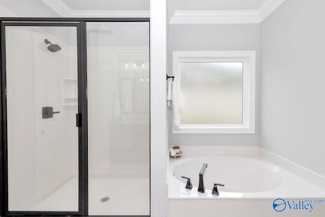 bathroom with shower with separate bathtub and ornamental molding