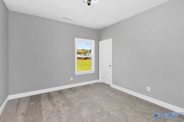 view of carpeted spare room