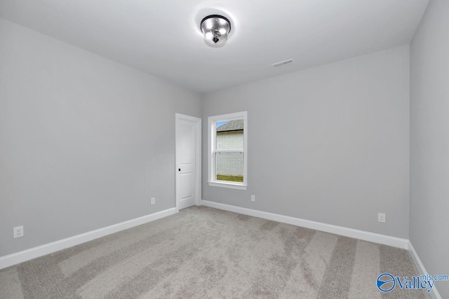 view of carpeted spare room