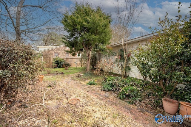 view of yard with fence