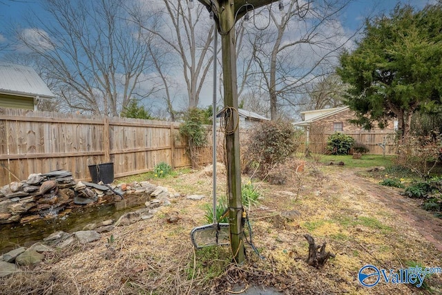 view of yard with fence