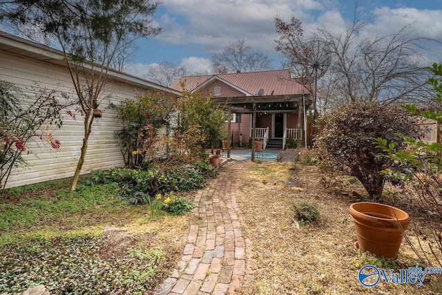 view of front of home with metal roof