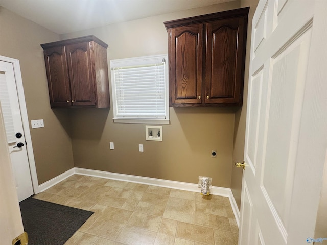 clothes washing area with cabinet space, washer hookup, baseboards, and electric dryer hookup