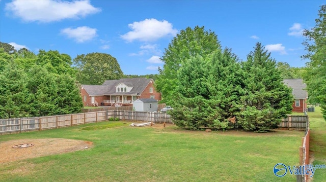 view of yard with a fenced backyard