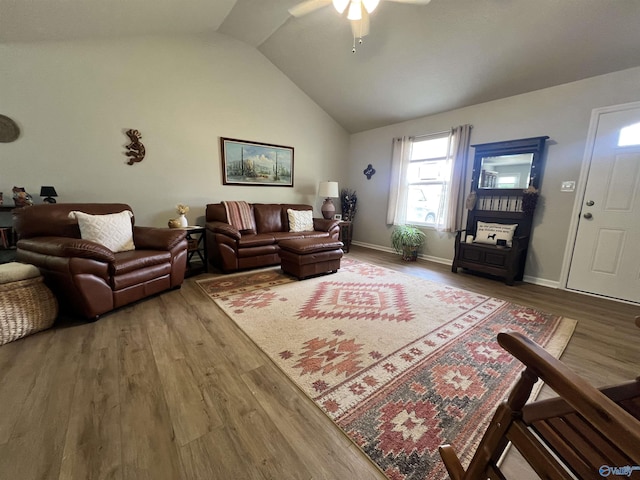 1006 SW 6th St, Attalla, AL 35954 - living area featuring wood finished floors, a ceiling fan, lofted ceiling, and baseboards