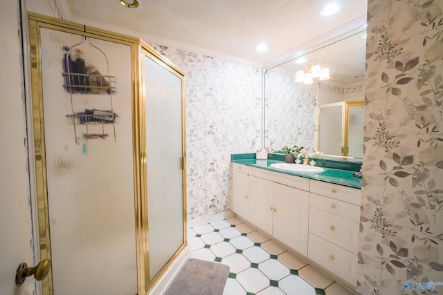 bathroom featuring walk in shower, vanity, crown molding, and tile patterned flooring