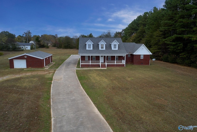 cape cod house with a front yard and covered porch