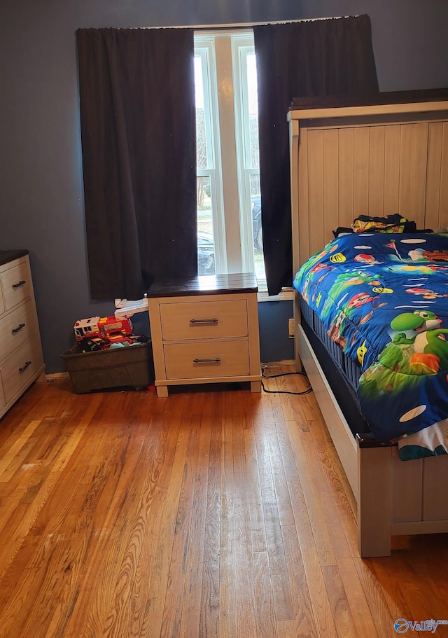 bedroom featuring light wood-type flooring