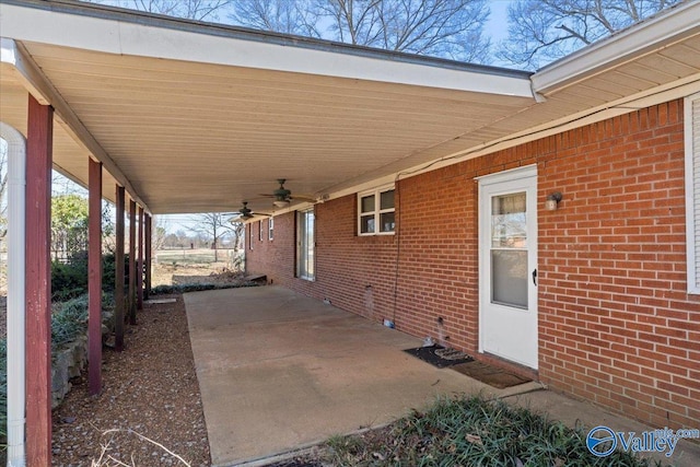 view of patio / terrace featuring a carport and ceiling fan