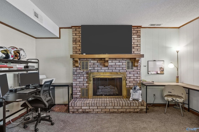 office space featuring carpet, a fireplace, and a textured ceiling