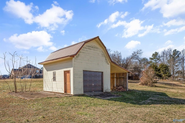 garage with a yard