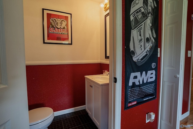 208 Burgess Ave, Rainsville, AL 35986 - half bathroom with vanity, toilet, and tile patterned flooring