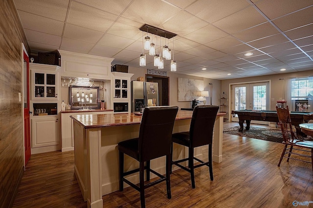 208 Burgess Ave, Rainsville, AL 35986 - kitchen featuring stainless steel refrigerator with ice dispenser, dark wood-style floors, a center island, billiards table, and glass insert cabinets