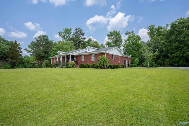 208 Burgess Ave, Rainsville, AL 35986 - view of front of property featuring a front yard and brick siding