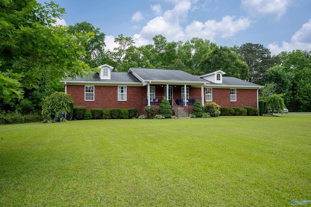 208 Burgess Ave, Rainsville, AL 35986 - single story home with covered porch, a front yard, and brick siding